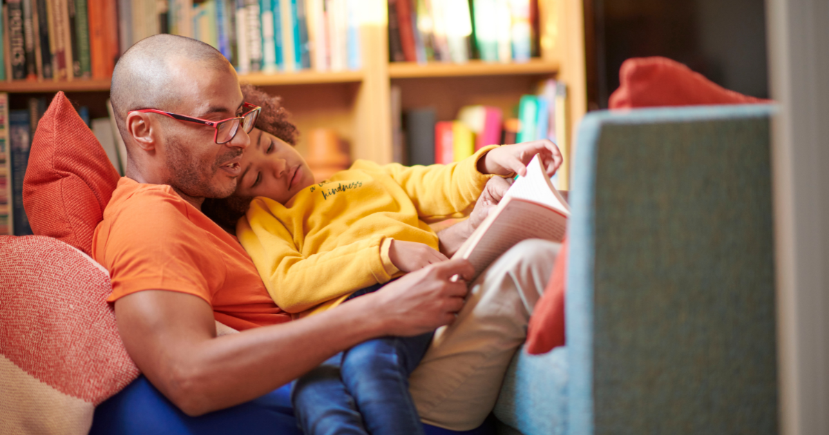 Heat Pump Week 15 CBH A family on the sofa reading in a warm home